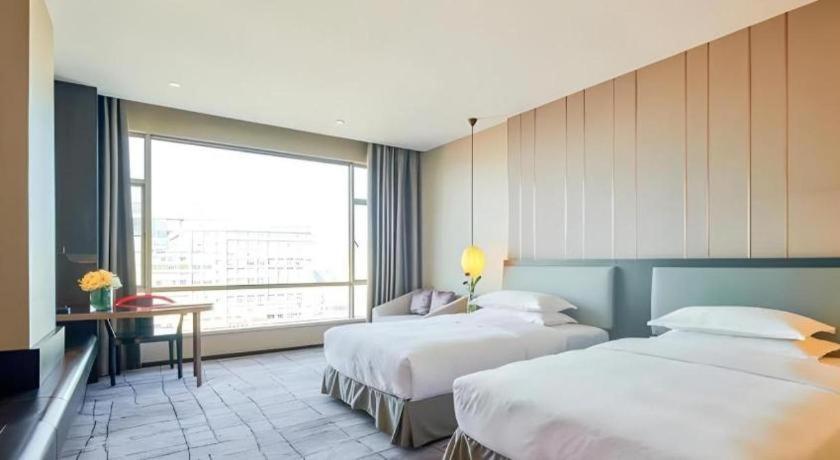 Maison New Century Hotel Dongguan Tungkuan Kültér fotó